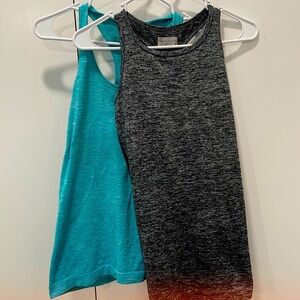 Lululemon sz 6 and Athleta sz M  tops!  Excellent condition.  Both tops for $15.